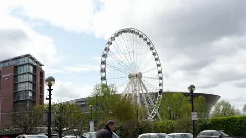 Wide angle with a view towards the ferris wheel of Liverpool Stock Footage 304892238