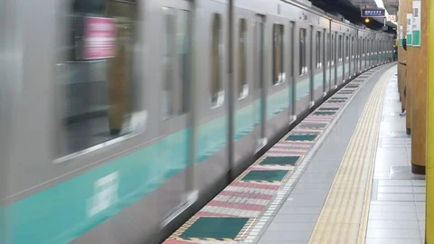 Wide angle view on the train station while the train is leaving from the Stock Footage 119266141