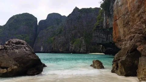 Wide angle view of turquoise cove and white sand beach on Phi Phi Islands Stock Footage 345552627