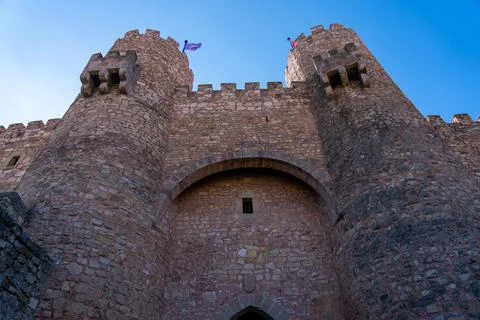 Wide Angle View of Two Rock Tower On External Wall of Spanish Castle Stock Photos