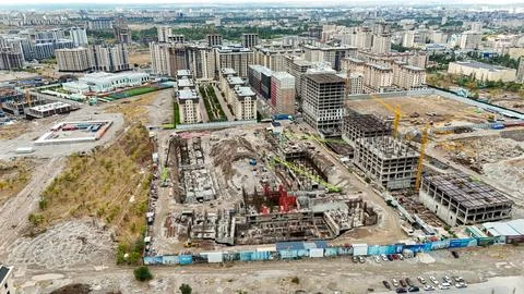 Wide-angle view of urban development with many buildings under construction Stock Photos
