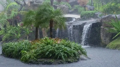 Wide Angle View Of Waterfall At Resort In A Rain Storm, Maui, Hawaii Video stock 73527790