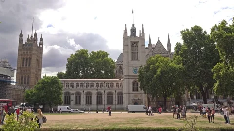Wide angle view of Westminster Abbey viewed from Parliament Square in the day Stock Footage 205914092