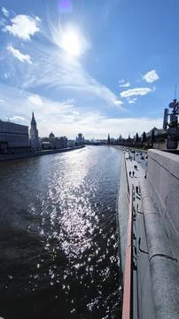 Wide angle view of a wide river sparkling in the bright sun 库存照片