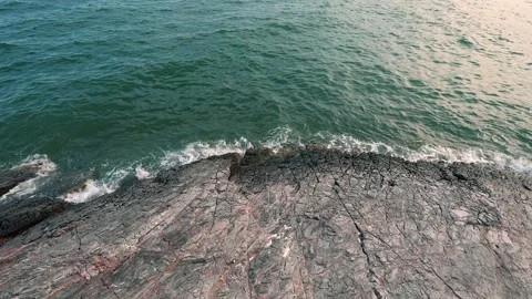 Wide angle waves on rocks Stock Footage 295238750