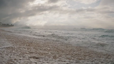 Wide Angle of Waves Running Along Beach 4K Stock Footage 267048647