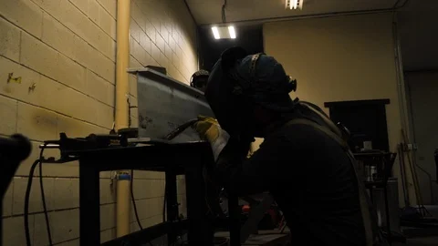 Wide angle welder in shop working Video stock 122178673