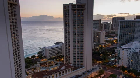 Wide angle zoom out time lapse of sunset on Waikiki beach Stock Footage 49910454