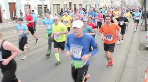 Wide angled focused shot People running at half Marathon event Stock Footage 36989990