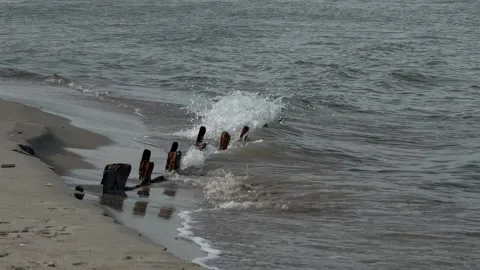 Wide Baltic Sea Waves Breaking Around Wooden Groynes Stock Footage 336560064