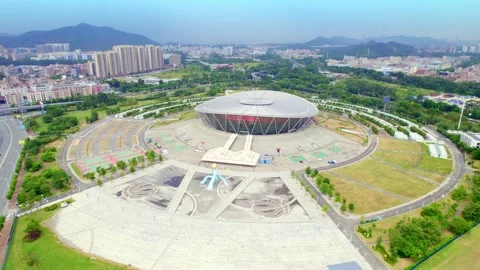 Wide basketball arena grounds within an urban landscape in Dongguan 스톡 동영상 346756943