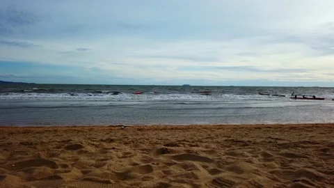 Wide of Beach Waves Golden Sands Beautiful Colors Stock Footage 148367385