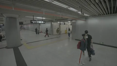 Wide Beijing Subway Concourse with Moving Passengers 스톡 동영상 341457553