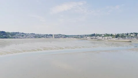 A wide, bright daytime view of Binic beach and town in Brittany, France Stock Footage 346671489