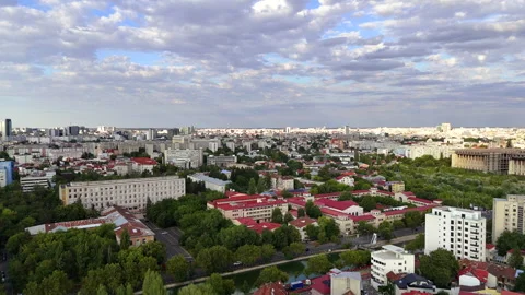 Wide city panorama of Bucharest under a cloudy summer sky Stock Footage 320950706