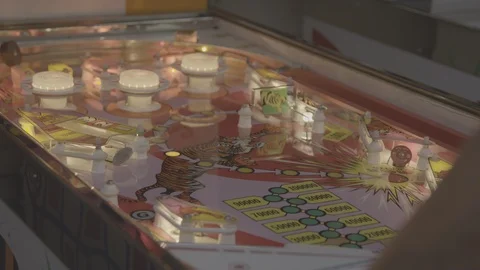 Wide classic pinball machine being played full playing field 4K UNGRADED Stock Footage 122917011