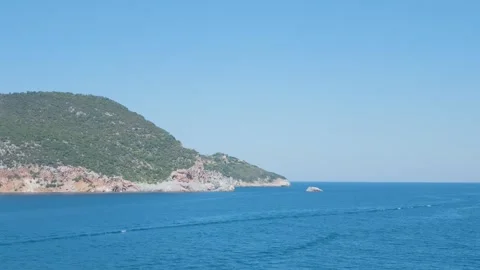 A wide, clear daytime view of the coastline of Skopelos, an island in the Stock Footage 346695399