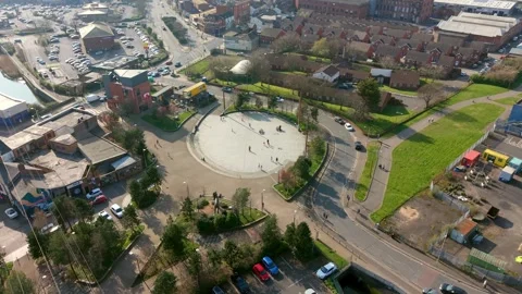 Wide clockwise 4K 60FPS aerial video of C.S. Lewis Square on the Newtownards Stock Footage 332626976