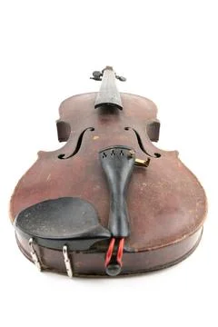 Wide closeup studio shot of old, broken, dust covered violin isolated on white Stock Photos