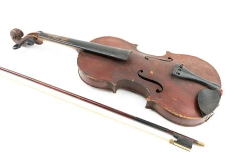 Wide closeup studio shot of old, broken, dust covered violin isolated on white Stock Photos