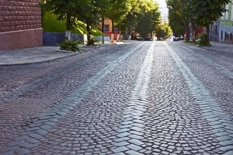 Wide cobbled road Stock Photos