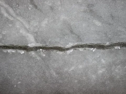 Wide Cold Crack between Two Large Ice Floes Stock Photos