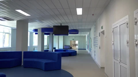 Wide corridor includes cozy spot for students to rest Stock Footage 278713950