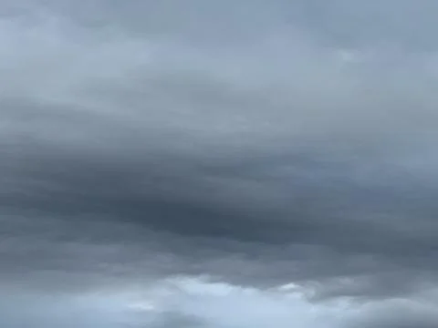 Wide Dark Gray Storm Clouds Background Stock-Fotos