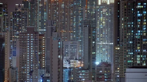 Wide day to night transition timelapse of Hong Kong apartments. Stock Footage