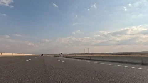 Wide Desert Road Between Cairo and Ain Sokhna Showing Steady Traffic Movement Stock Footage 329966394
