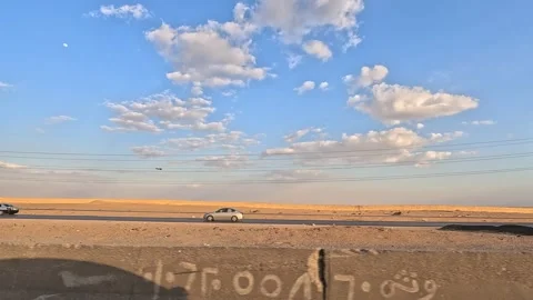 Wide desert views appear during calm drive Cairo Fayoum Desert Road highway Stock-Footage 330084637