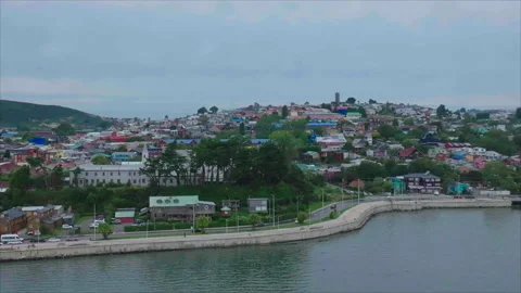 Wide drone advancing toward Puerto Montt Stockbeeldmateriaal 340991947