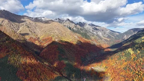 Wide Drone Landscape of Fall Mountains and Peaks Stock Footage 332922298