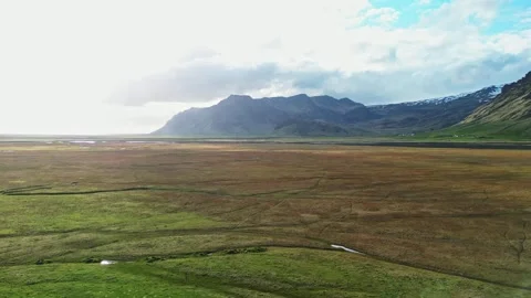 Wide drone panorama of mountain valley in South Iceland 4K Stock Footage 344112189