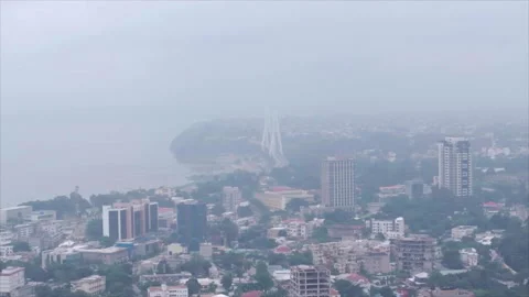 Wide drone right-to-left pan over Brazzaville, Congo Stock Footage 331999308