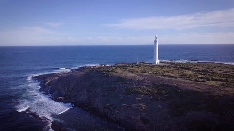 Wide drone shot of Cape Leeuwin Lighthouse Augusta, Western Australia Видео 101004106