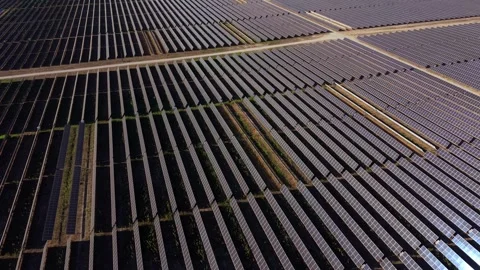 Wide drone shot captures organized solar field 스톡 동영상 346064457