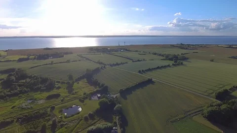 Wide drone shot of fields and windmills in Denmark Video stock 113041160