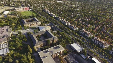 Wide drone shot tracking forward over Universidad de los Andes and nearby Stock Footage 332560992