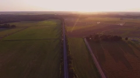 Wide drone shot of train tracks in rice fields Stock Footage 82322815