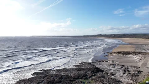 Wide Drone Tracking Forward Over Waves and Rocky Coast, Wales UK 4K Stock-Footage 334070733