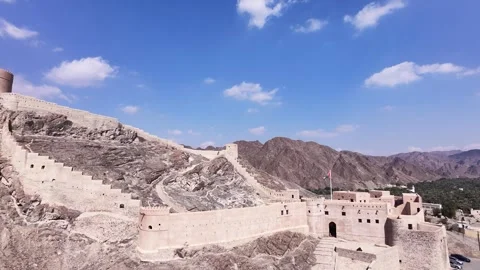 A wide drone tracking shot of Samail Fort Stock Footage 338238522
