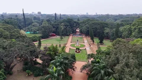 Wide drone view of Lalbagh Botanical Garden in Bengaluru showcasing lush gr.. Video stock 330274533
