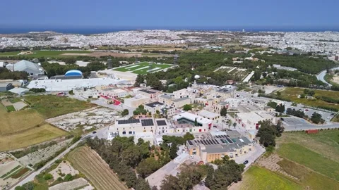 Wide drone view of Park Nazzjonali in Ta' Qali with paths and farmland Stock Footage 336468745