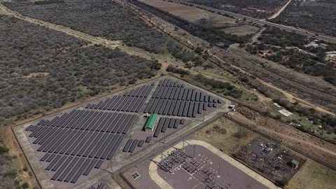 Wide Drone View of Solar Farm in Dry African Landscape Video stock 342632873