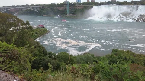 Wide elevated view across the Niagara gorge to the American Falls Stock Footage 345996046