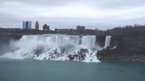 Wide, elevated view of the American Falls at Niagara. Shows the full span of Stock Footage 336438247