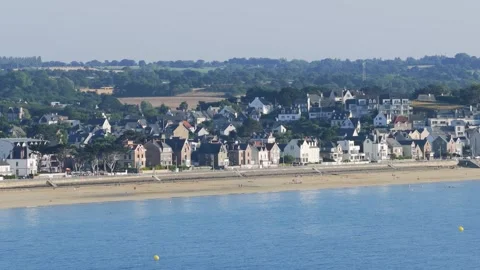 A wide, elevated view of Pleneuf Val Andre beach and town on a clear summer day Stock Footage 346713315
