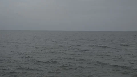 Wide, empty ocean backdrop fill with distant horizon Stock Footage 244811405