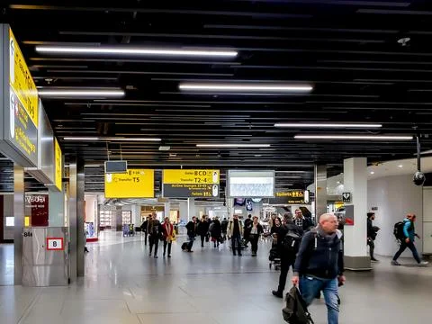 Wide expansive concourse inside Amsterdam Airport Schiphol Stock Photos